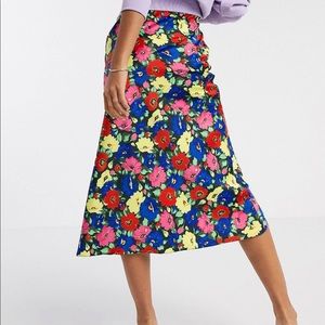 ASOS DESIGN satin bias midi skirt in bright floral